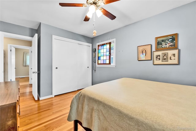 4006 Highfield Rd, Royal Oak, MI 48073 - bedroom with light wood-style flooring, multiple windows, a closet, and ceiling fan