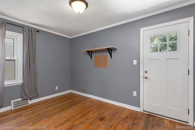 545 E Maplehurst St, Ferndale, MI 48220 - foyer featuring hardwood / wood-style floors and ornamental molding