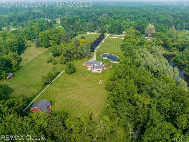 8173 Earhart Rd, South Lyon, MI 48178 - aerial view of sparsely populated area featuring a forest