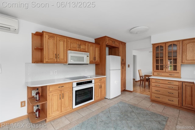 8173 Earhart Rd, South Lyon, MI 48178 - kitchen featuring white appliances, open shelves, light countertops, glass insert cabinets, and light tile patterned floors