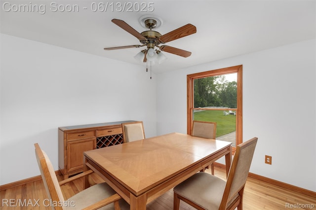8173 Earhart Rd, South Lyon, MI 48178 - dining space featuring baseboards, light wood finished floors, and a ceiling fan