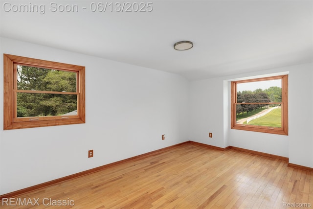 8173 Earhart Rd, South Lyon, MI 48178 - unfurnished room with light wood-style floors and baseboards
