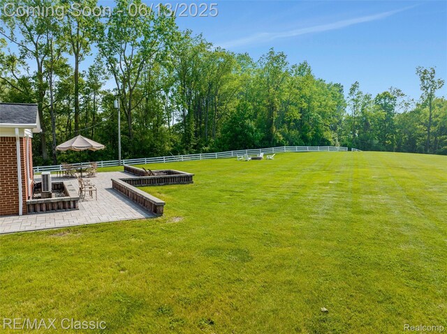 8173 Earhart Rd, South Lyon, MI 48178 - view of yard with a patio area