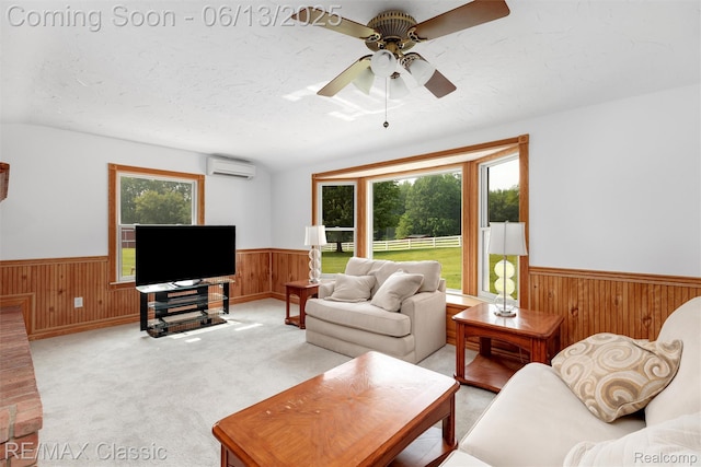 8173 Earhart Rd, South Lyon, MI 48178 - living room with an AC wall unit, a wainscoted wall, wood walls, healthy amount of natural light, and a ceiling fan