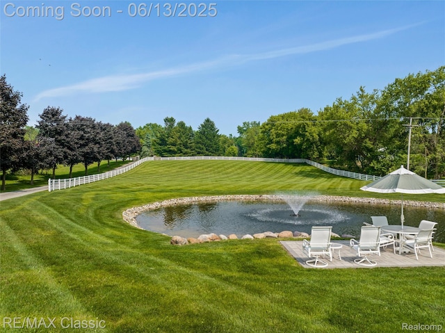 8173 Earhart Rd, South Lyon, MI 48178 - view of property's community with a water view and a lawn
