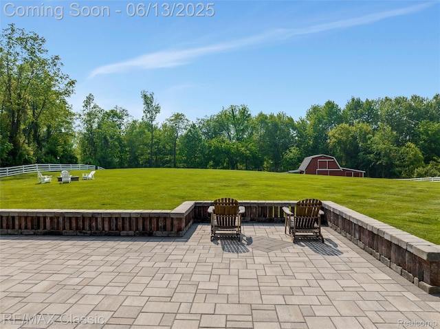 8173 Earhart Rd, South Lyon, MI 48178 - view of patio with a barn and an outdoor structure