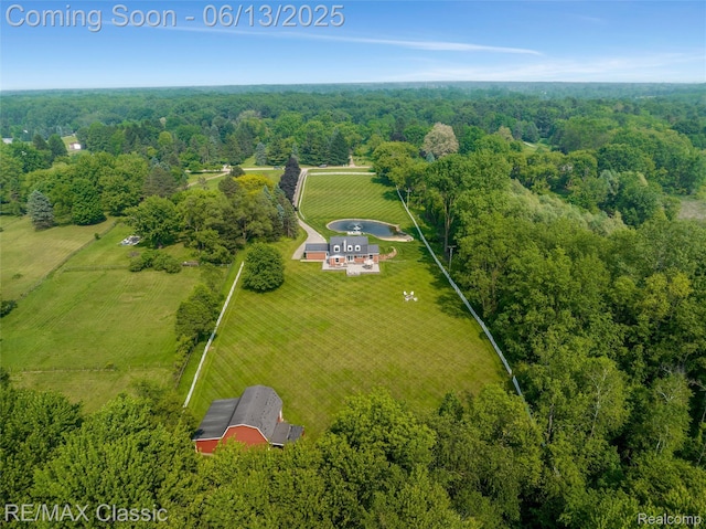 8173 Earhart Rd, South Lyon, MI 48178 - aerial view of sparsely populated area with a forest