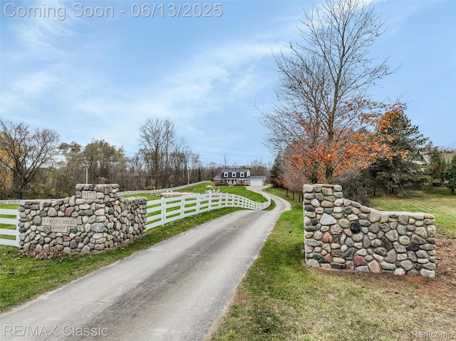 8173 Earhart Rd, South Lyon, MI 48178 - view of asphalt driveway
