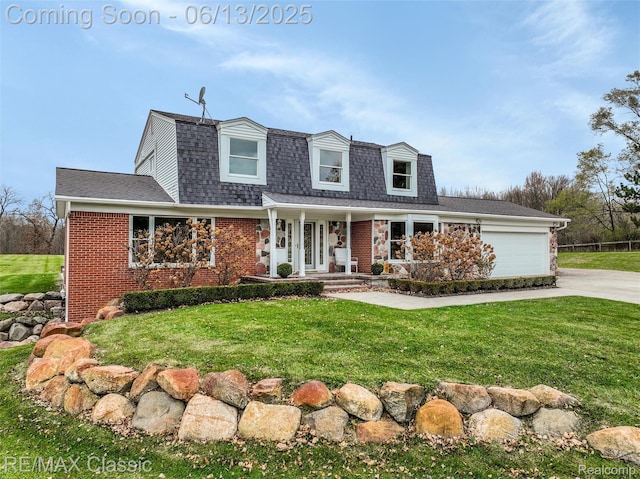 8173 Earhart Rd, South Lyon, MI 48178 - view of front of home with brick siding, covered porch, driveway, and a shingled roof