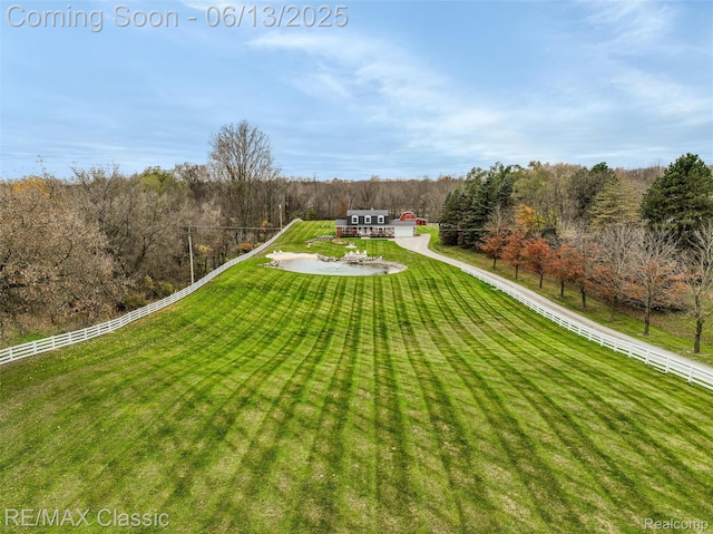 8173 Earhart Rd, South Lyon, MI 48178 - view of yard with a wooded view