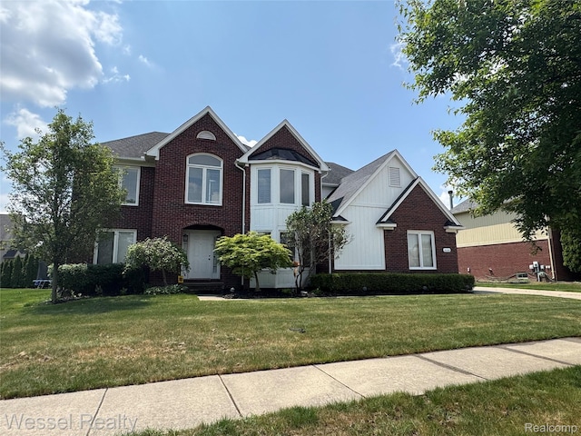 14232 Berryknoll Dr, Shelby Twp, MI 48315 - view of front of home featuring a front lawn and brick siding
