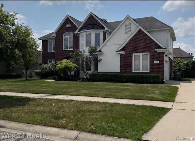 14232 Berryknoll Dr, Shelby Twp, MI 48315 - view of front facade with a front lawn and brick siding