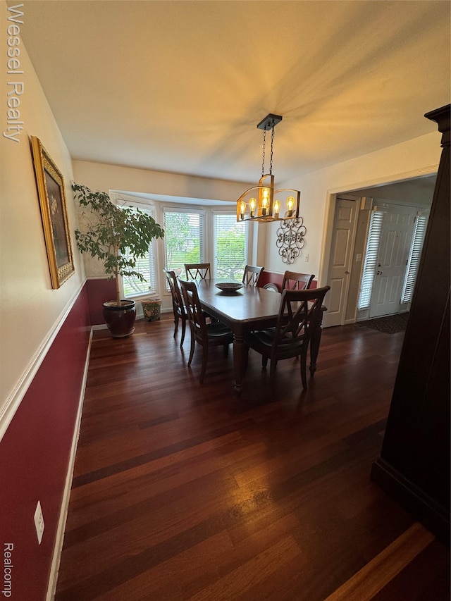 14232 Berryknoll Dr, Shelby Twp, MI 48315 - dining area featuring dark wood-style flooring and a chandelier