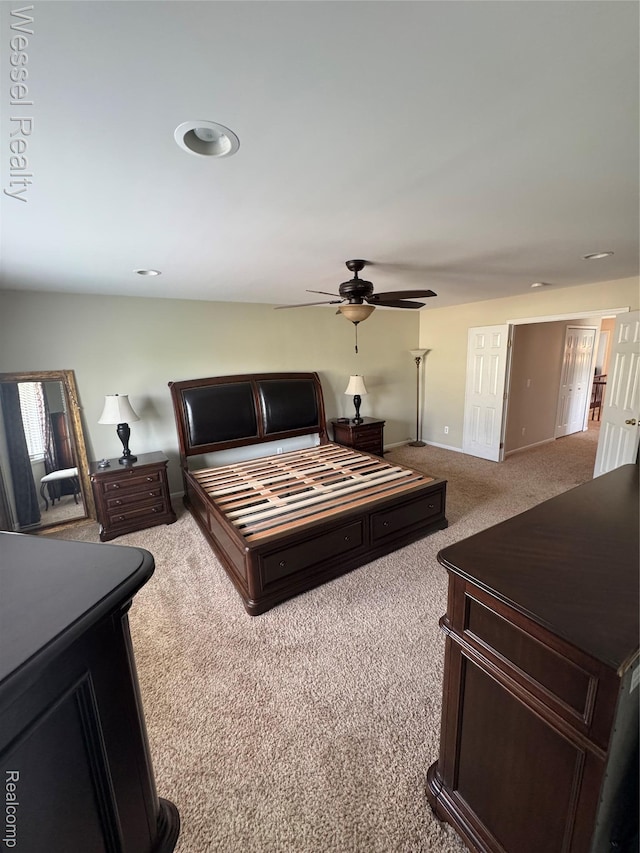 14232 Berryknoll Dr, Shelby Twp, MI 48315 - carpeted bedroom with baseboards and ceiling fan