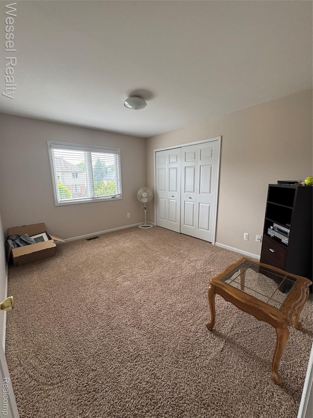 14232 Berryknoll Dr, Shelby Twp, MI 48315 - living area with carpet and baseboards