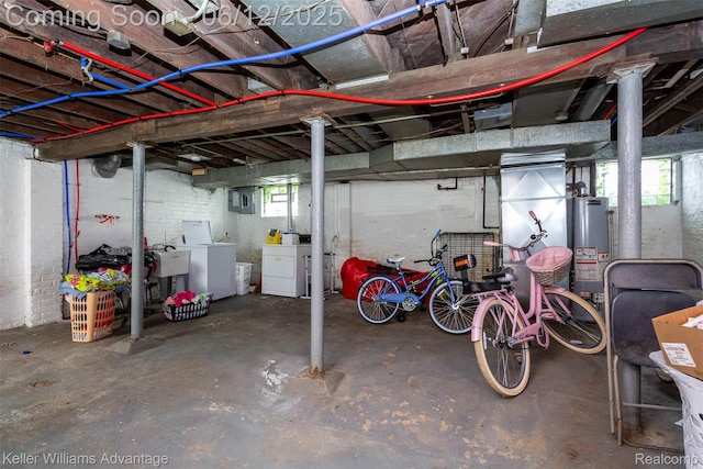 319 Marlborough St, Detroit, MI 48215 - below grade area with washer and clothes dryer, gas water heater, and electric panel