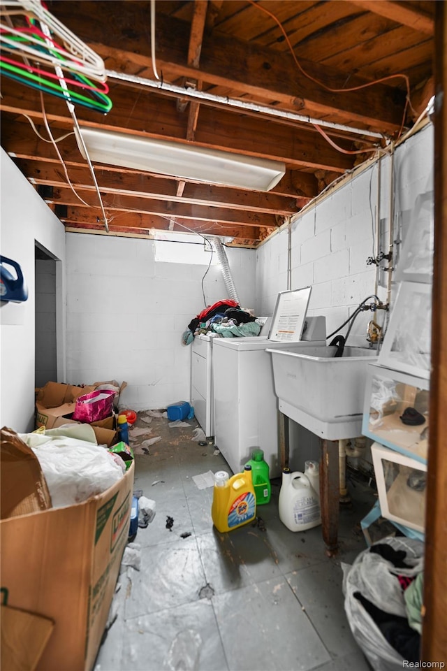 16752 Stricker Ave, Eastpointe, MI 48021 - unfinished below grade area featuring washer and dryer and concrete block wall