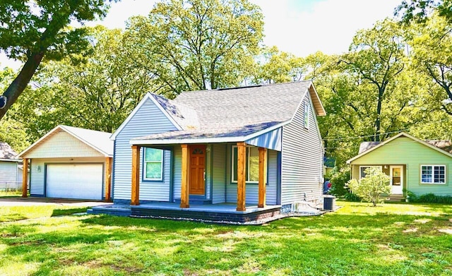 2924 Austin St, Muskegon, MI 49444 - bungalow-style house featuring a porch, cooling unit, a front yard, a garage, and roof with shingles