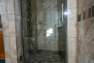 2924 Austin St, Muskegon, MI 49444 - bathroom featuring a stall shower