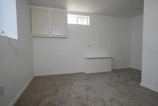 2924 Austin St, Muskegon, MI 49444 - basement featuring carpet floors and baseboards
