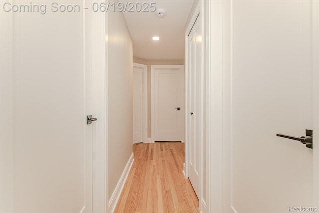 21993 Riverview Dr, Bloomfield Hills, MI 48025 - hall with light wood-type flooring and recessed lighting