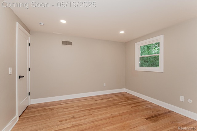 21993 Riverview Dr, Bloomfield Hills, MI 48025 - spare room featuring light wood finished floors and recessed lighting