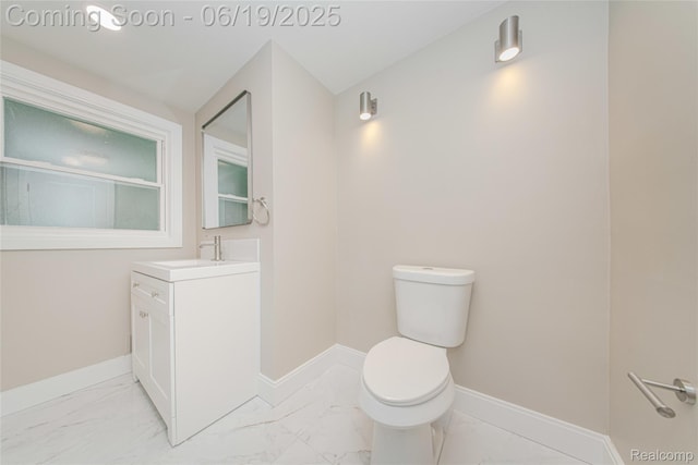 21993 Riverview Dr, Bloomfield Hills, MI 48025 - bathroom featuring marble finish floors and vanity