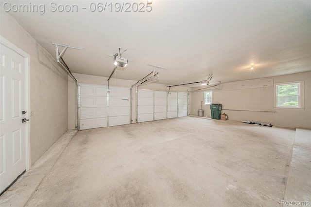 21993 Riverview Dr, Bloomfield Hills, MI 48025 - garage with a garage door opener