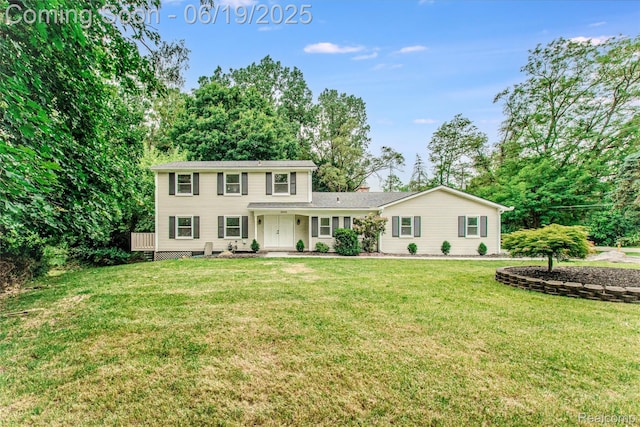 21993 Riverview Dr, Bloomfield Hills, MI 48025 - colonial house featuring a front yard