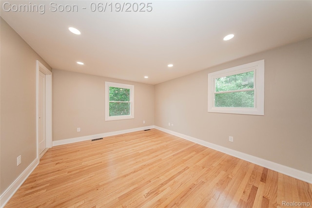21993 Riverview Dr, Bloomfield Hills, MI 48025 - unfurnished room featuring light wood-type flooring and recessed lighting
