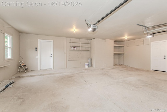 21993 Riverview Dr, Bloomfield Hills, MI 48025 - garage featuring a garage door opener