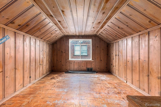 15377 Heyden St, Detroit, MI 48223 - bonus room with wood walls, vaulted ceiling, wooden ceiling, and wood-type flooring