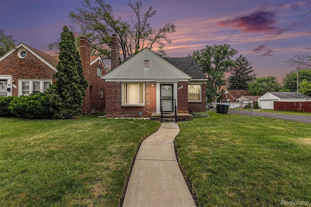 15377 Heyden St, Detroit, MI 48223 - bungalow-style house featuring brick siding, a chimney, and a shingled roof
