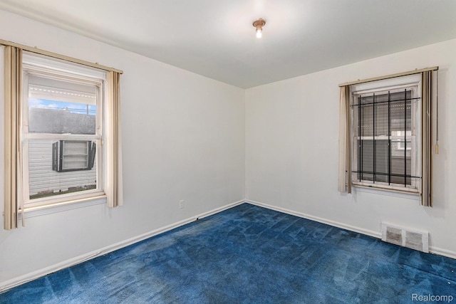 15377 Heyden St, Detroit, MI 48223 - spare room with dark carpet and baseboards