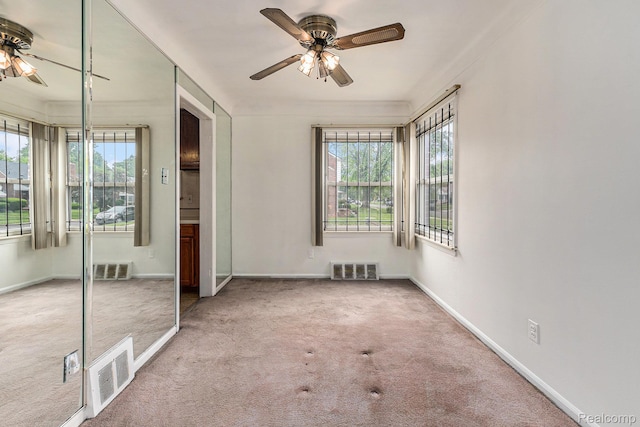 15377 Heyden St, Detroit, MI 48223 - carpeted spare room featuring a ceiling fan, healthy amount of natural light, and baseboards