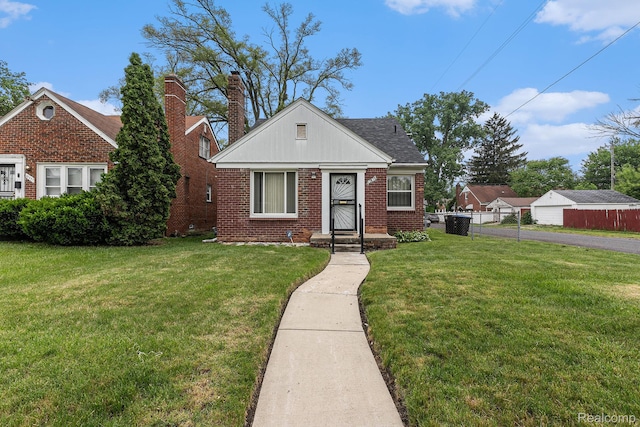 15377 Heyden St, Detroit, MI 48223 - bungalow-style home featuring brick siding and a chimney
