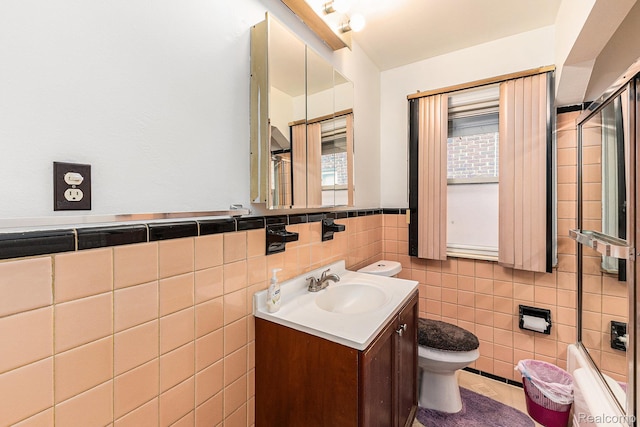 15377 Heyden St, Detroit, MI 48223 - full bath with toilet, tile walls, vanity, and a wainscoted wall
