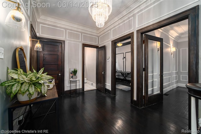 8604 La Salle Blvd, Detroit, MI 48206 - foyer featuring a decorative wall, ornamental molding, dark wood finished floors, a chandelier, and french doors