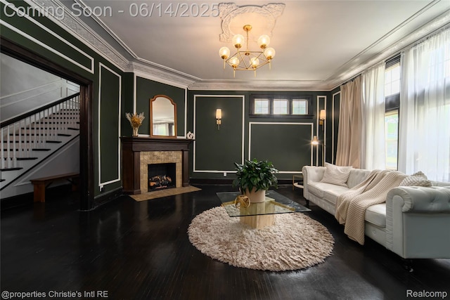 8604 La Salle Blvd, Detroit, MI 48206 - living area featuring stairway, crown molding, a chandelier, wood finished floors, and a fireplace