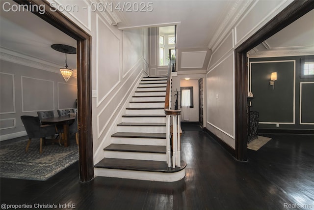 8604 La Salle Blvd, Detroit, MI 48206 - stairs with a decorative wall, ornamental molding, and wood finished floors