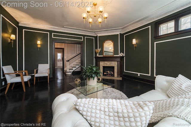8604 La Salle Blvd, Detroit, MI 48206 - living area featuring a chandelier, crown molding, a decorative wall, wood finished floors, and a tiled fireplace