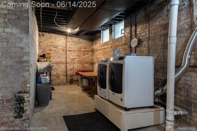 8604 La Salle Blvd, Detroit, MI 48206 - basement featuring washer and clothes dryer and brick wall