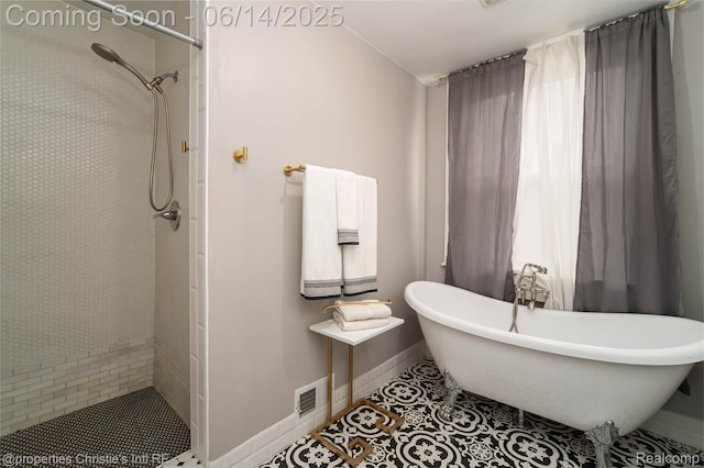 8604 La Salle Blvd, Detroit, MI 48206 - bathroom with tile patterned flooring, a tile shower, and a freestanding tub