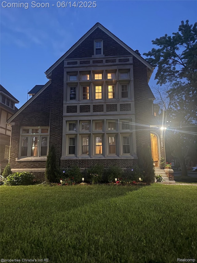 8604 La Salle Blvd, Detroit, MI 48206 - back of house with brick siding and a yard