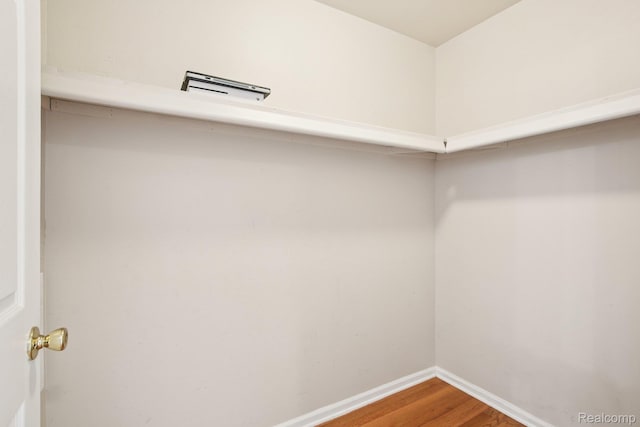 3871 Elvera Ln, Warren, MI 48092 - walk in closet with wood finished floors