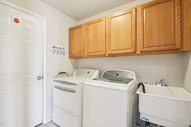 3871 Elvera Ln, Warren, MI 48092 - laundry room featuring cabinet space and washer and dryer