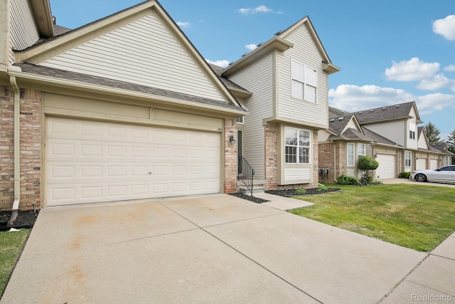 3871 Elvera Ln, Warren, MI 48092 - traditional-style home with driveway, a front lawn, brick siding, an attached garage, and a shingled roof