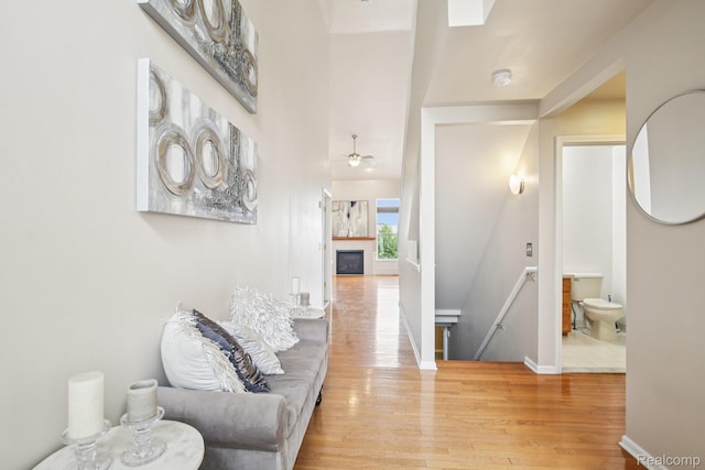 3871 Elvera Ln, Warren, MI 48092 - corridor with light wood-type flooring and an upstairs landing