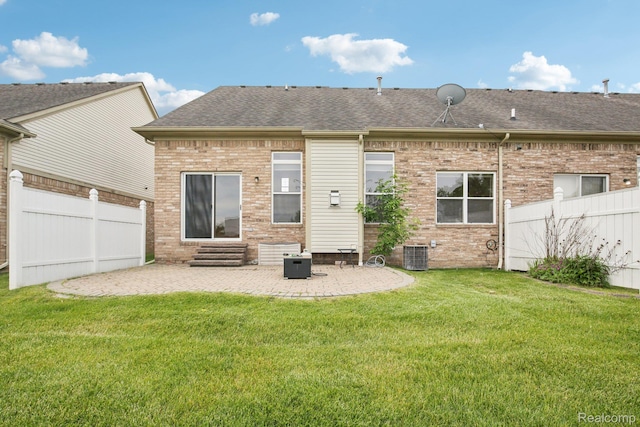 3871 Elvera Ln, Warren, MI 48092 - rear view of house with entry steps, a patio area, and roof with shingles
