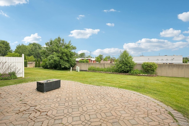 3871 Elvera Ln, Warren, MI 48092 - view of patio with an outdoor fire pit